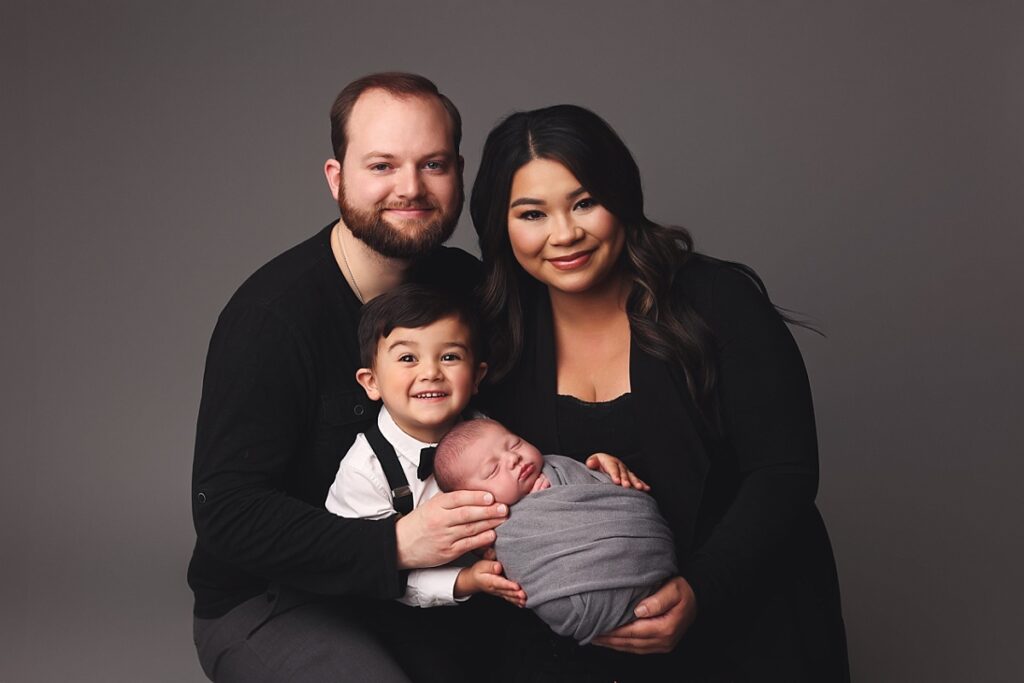 book newborn session, best Kansas City newborn photographer, newborn photoshoot Overland Park, Olathe newborn portrait studio, professional newborn photos, newborn photography packages