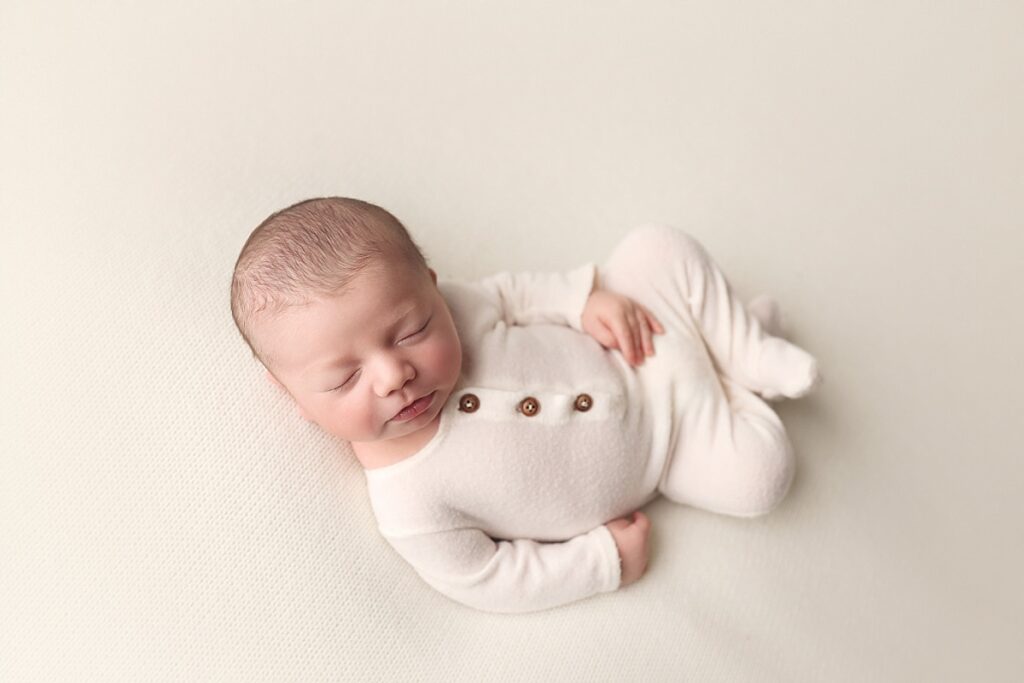 book newborn session, best Kansas City newborn photographer, newborn photoshoot Overland Park, Olathe newborn portrait studio, professional newborn photos, newborn photography packages