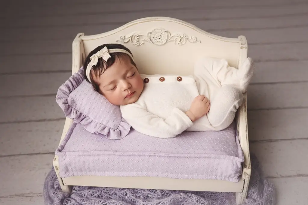 Fine art newborn photography of baby girl in Kansas City Missouri studio