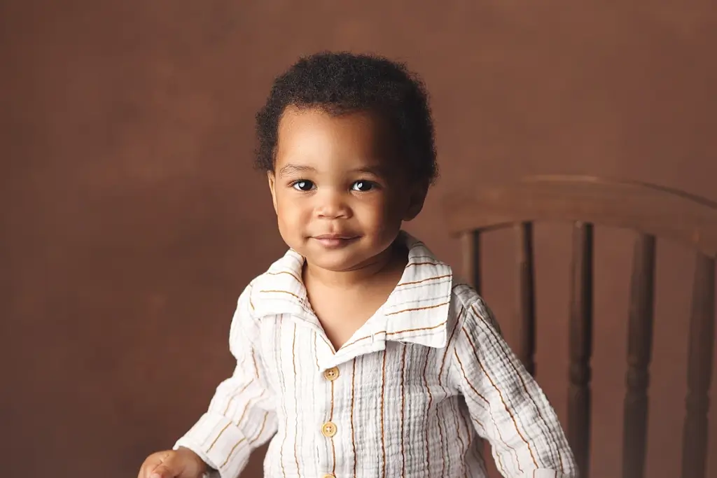 Professional close-up of baby boy before cake smash in Kansas City