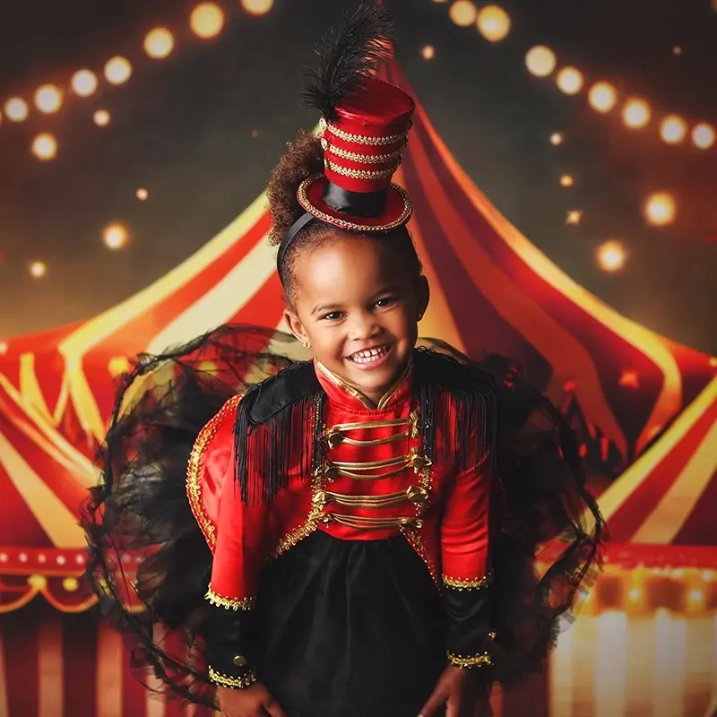 little-girl-birthday-milestone-session-circus-theme-kc Little girl in circus-themed first birthday photo session by Anna Marie Photography, testimonial from Kristina praising themed set ups and details.