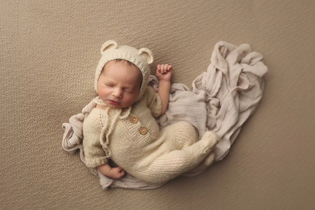 Professional Kansas City newborn photographer portrait of sleeping baby boy