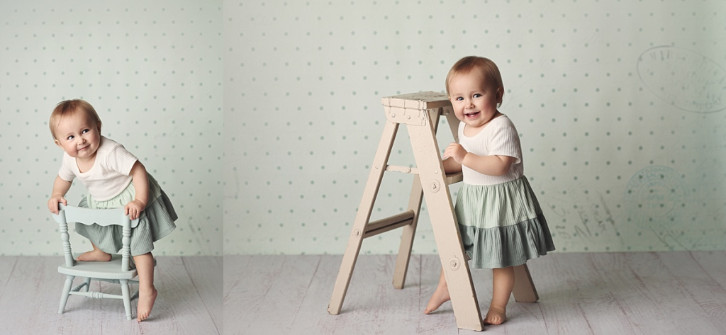 Traditional first birthday portrait of baby girl before cake smash in Kansas City studio