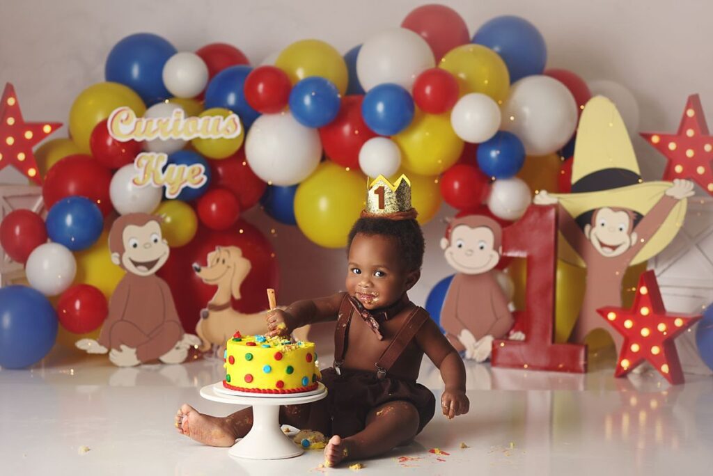 Curious George cake smash in Kansas City photography studio
