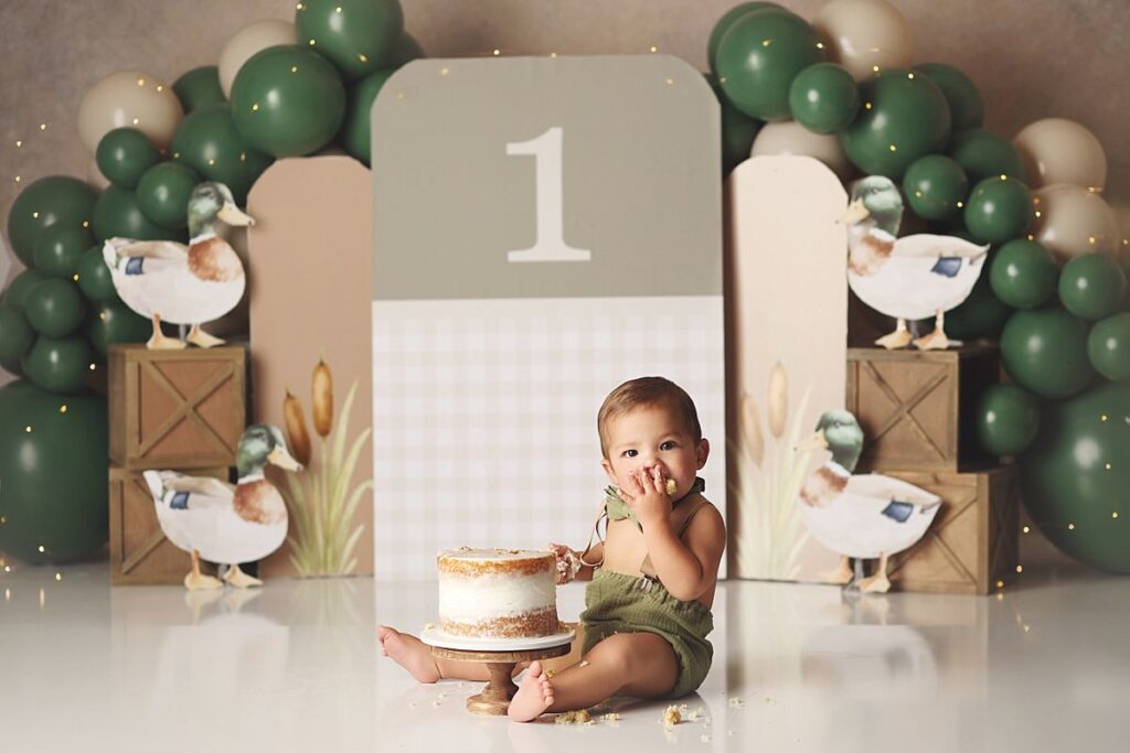 mallard themed cake smash for little boy at kansas city photography studio