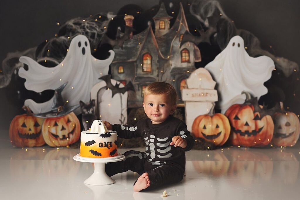 spooky one year old photoshoot for baby boy at kansas city photography studio