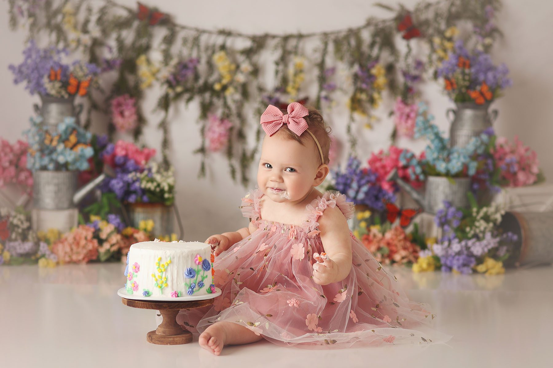 Kansas City cake smash photography session with baby girl and wildflower theme