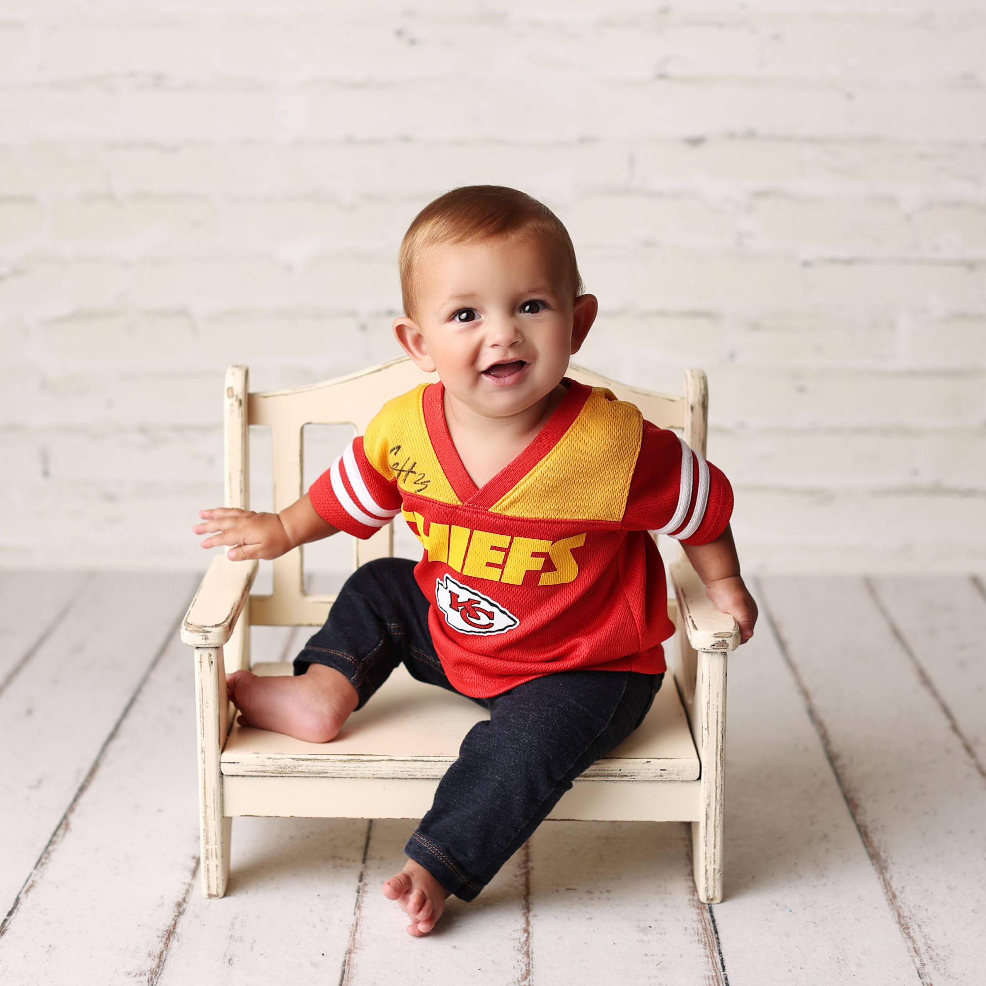 Overland Park baby boy milestone session in Chiefs jersey