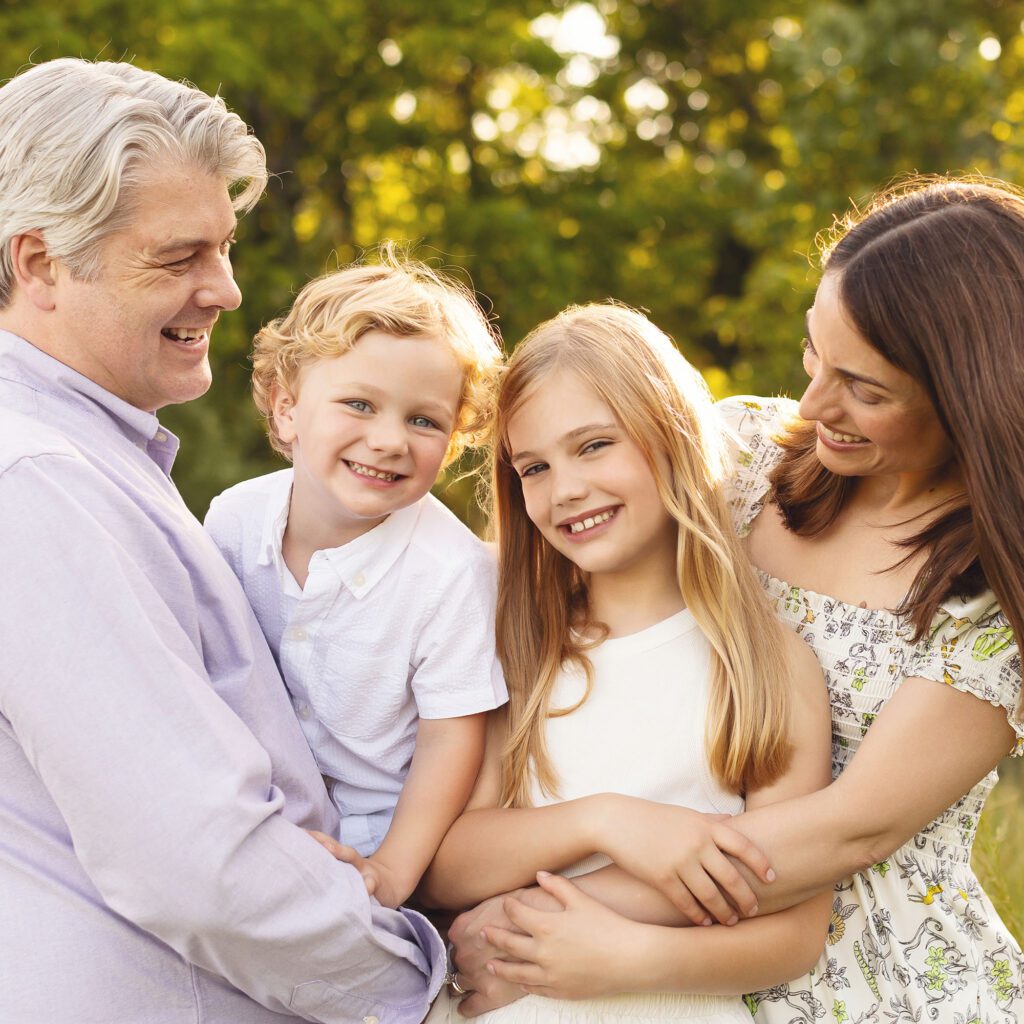 Candid summer family portrait photographed outdoors
